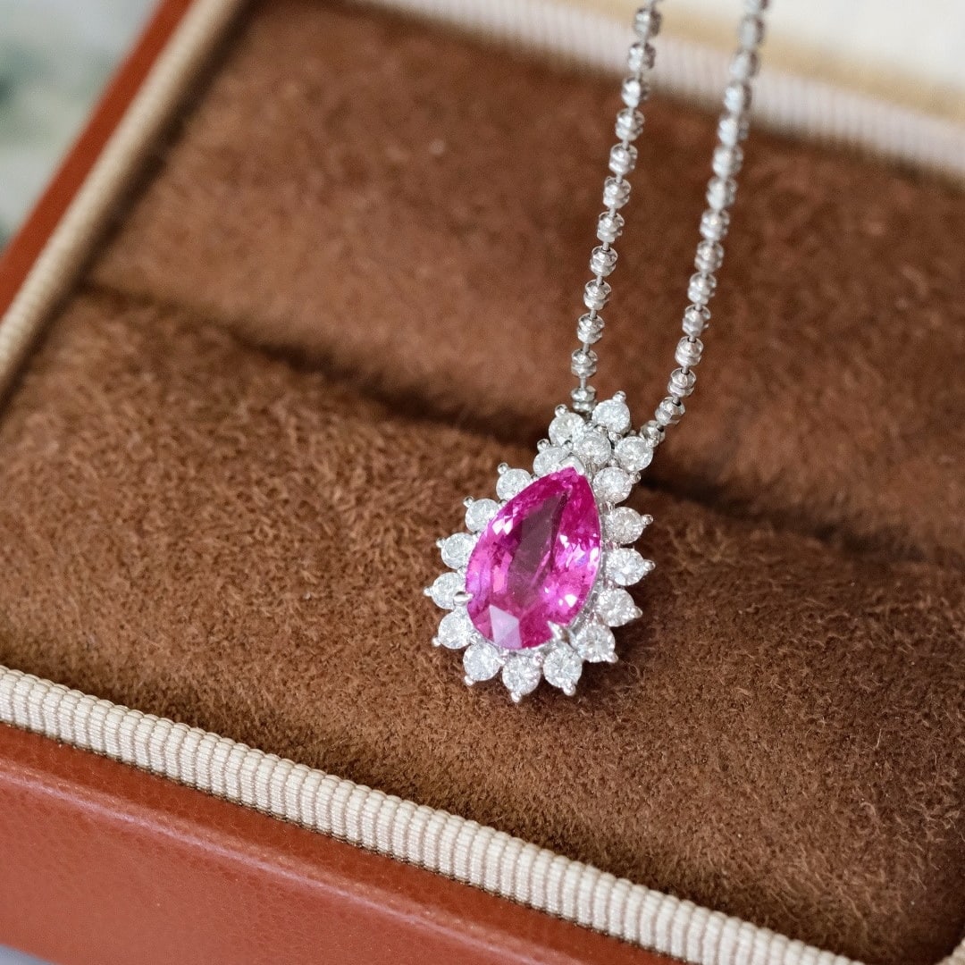 14k Gold 2.64 Ctw Natural Sapphire & Diamond Pendant( Without Chain ): Ref:231180316 // gold content:14k gold // main gemstone:sapphire // shape:pear // carat weight:2. 09ct // color:pink // treatment:natural // // adjacent gemstone 2 : diamond // shape:round // carat