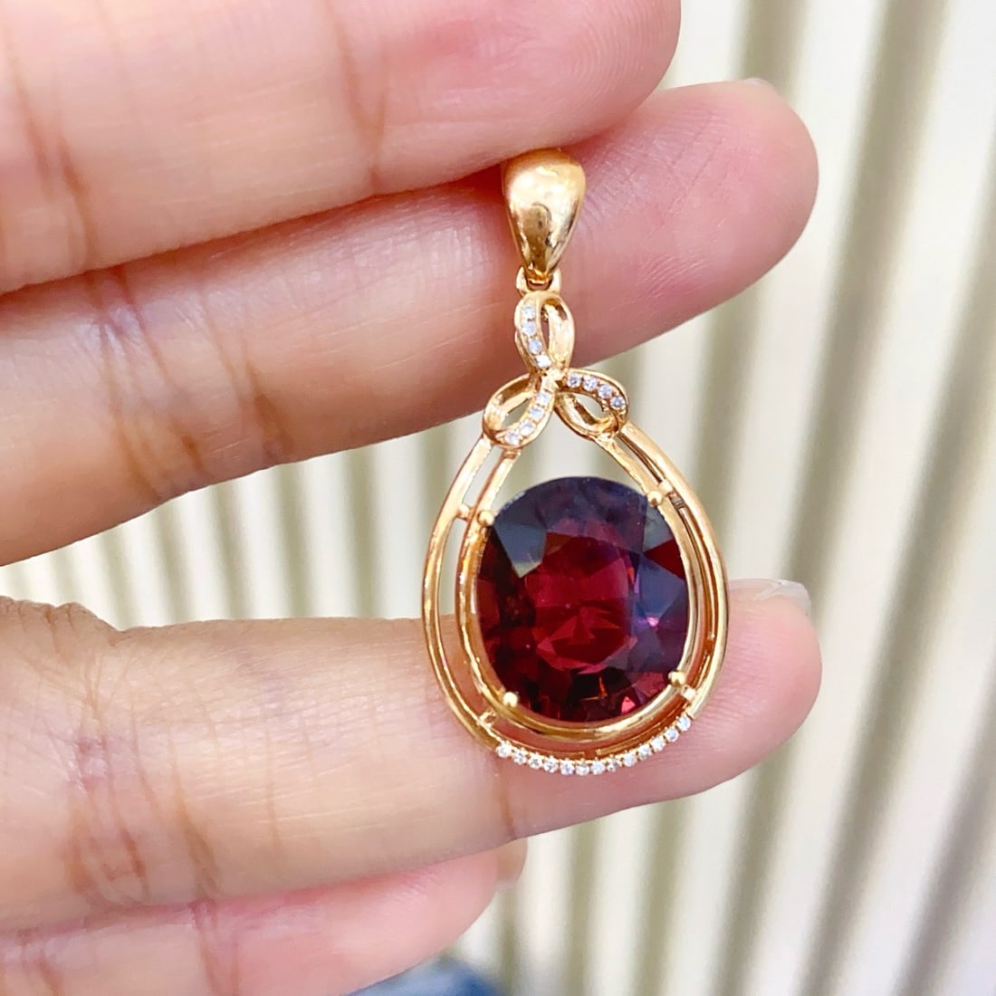 14k Gold 6.00 Ct Natural Tourmaline & Diamond Pendant( Without Chain ): Ref:231180362 // gold content:14k gold // main gemstone:tourmaline // shape:oval // carat weight:6. 00ct // color:red // treatment:natural // // adjacent gemstone 2 : diamond // number of stones:25