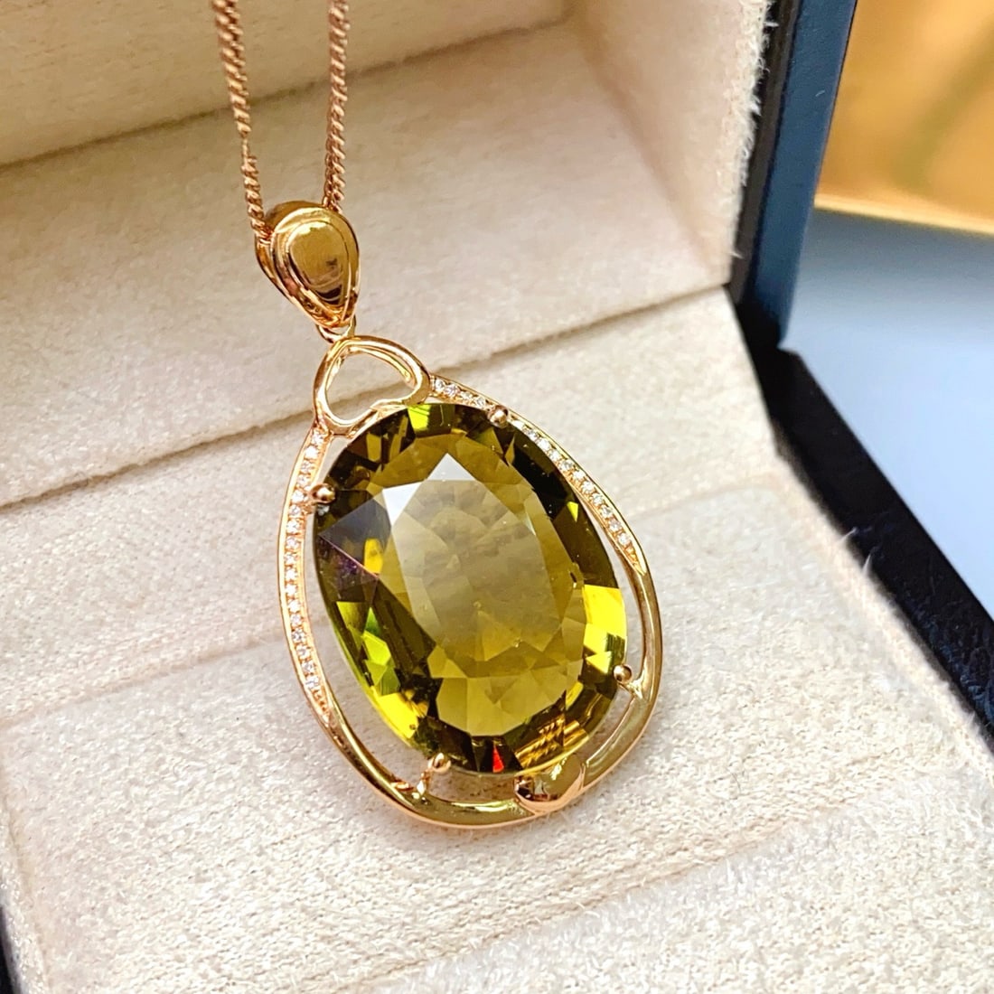 14k Gold 13.90 Ct Natural Tourmaline & Diamond Pendant( Without Chain ): Ref:231180365 // gold content:14k gold // main gemstone:tourmaline // shape:oval // carat weight:13. 90ct // color:green // treatment:natural // // adjacent gemstone 2 : diamond // number of stones:34