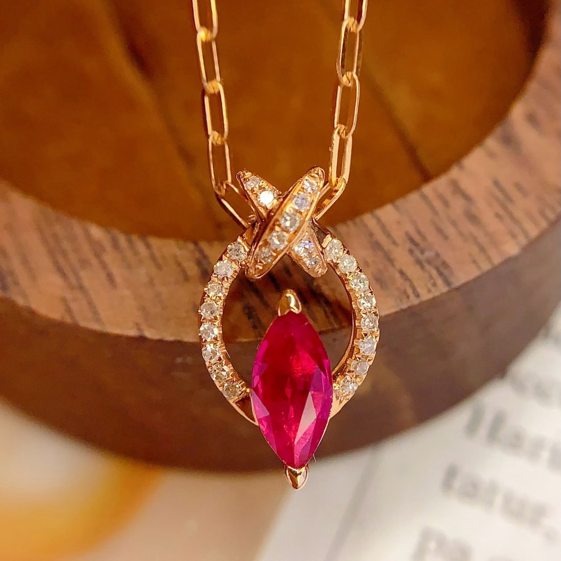14k Gold 0.85 Ct Natural Ruby & Diamond Pendant( Without Chain ): Ref:231180429 // gold content:14k gold // main gemstone:ruby // shape:marquise // carat weight:0. 85ct // color:red // treatment:natural // // adjacent gemstone 2 : diamond // number of stones:25 //