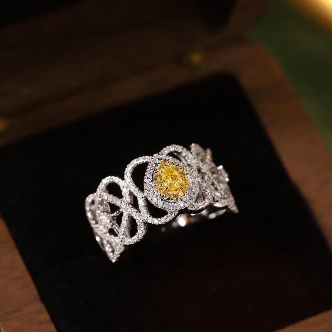 14k Gold 0.55 Ctw Natural Yellow Diamond & Diamond Ring: Ref:231181013 // gold content:14k gold // ring size:7. 25us // // main gemstone:yellow diamond // shape:pear // carat weight:0. 1ct // color:yellow // treatment:natural // // adjacent gemstone 2 : dia