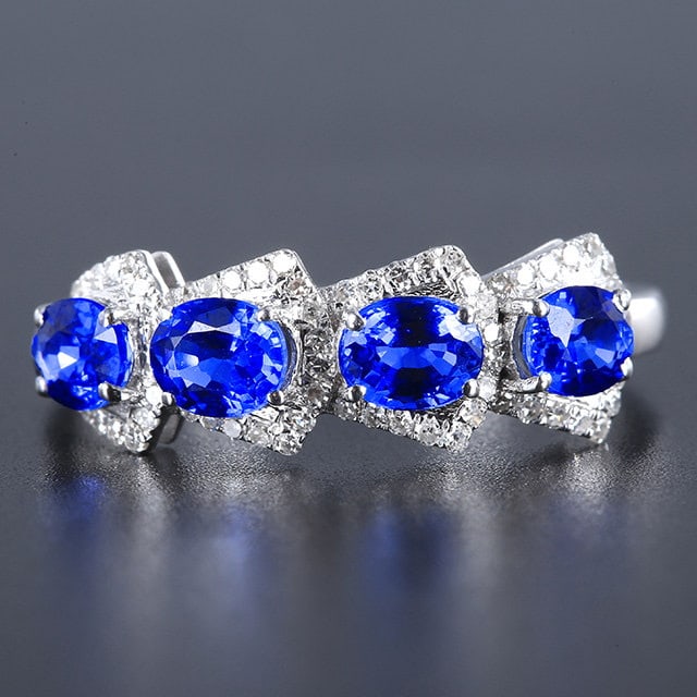 14k Gold 1.58 Ctw Natural Sapphire & Diamond Ring: Ref:231181028 // gold content:14k gold // ring size:7. 25us // // main gemstone:sapphire // shape:oval // carat weight:1. 39ct // color:blue // treatment:natural // // adjacent gemstone 2 : diamond