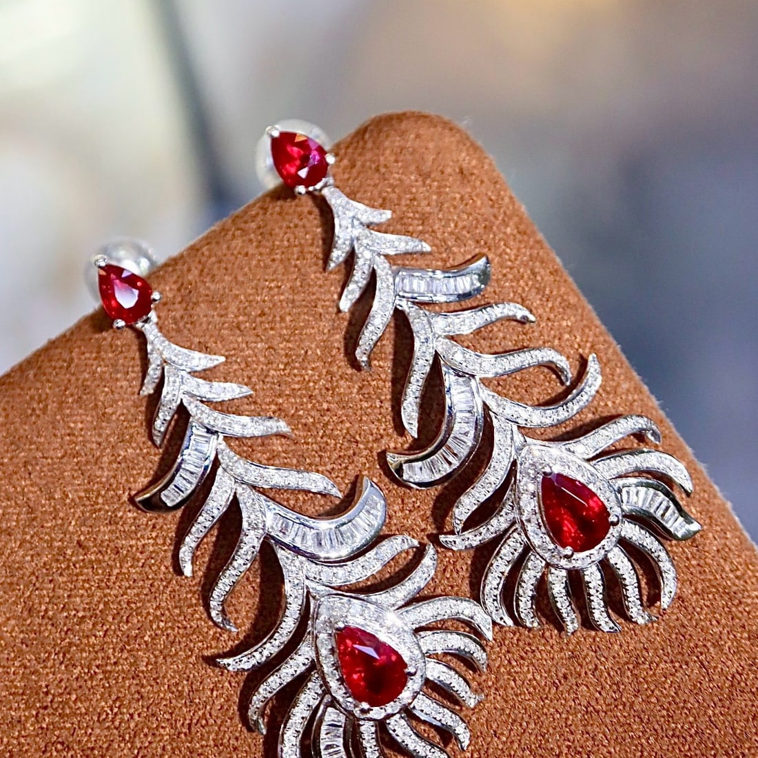 14k Gold 3.13 Ctw Vivid Red Natural Ruby & Diamond Earrings: Ref:231181080 // gold content:14k gold // main gemstone:ruby // shape:pear // carat weight:1. 58ct // color:vivid red // treatment:natural // // adjacent gemstone 2 : diamond // shape:multiple // cara