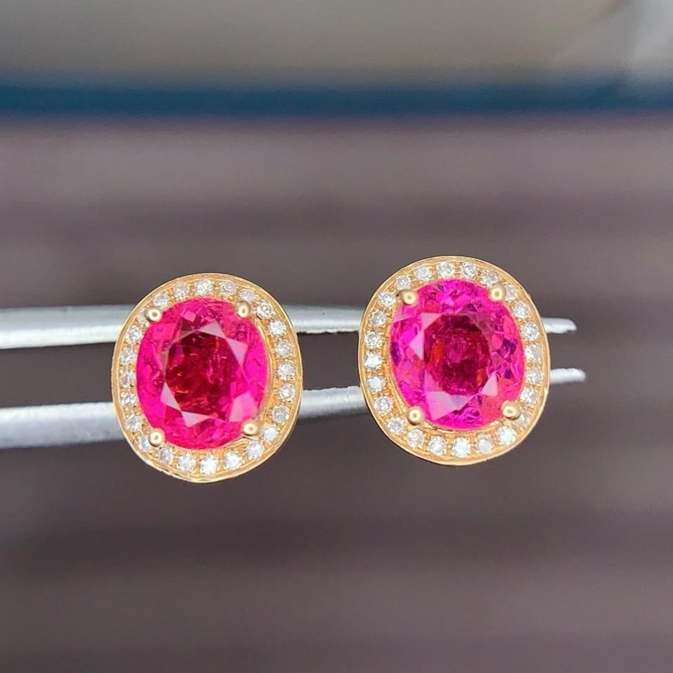 14k Gold 1.8 Ct Natural Tourmaline & Diamond Earrings: Ref:231181115 // gold content:14k gold // main gemstone:tourmaline // shape:oval // carat weight:1. 8ct // color:red // treatment:natural // // adjacent gemstone 2 : diamond // shape:round // clarity