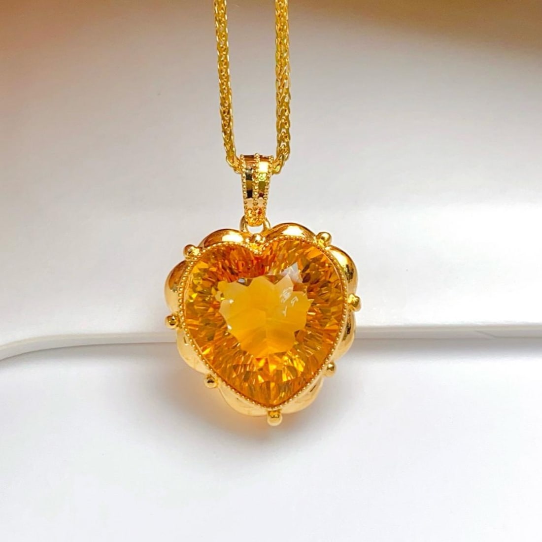 14k Gold 8.80 Ct Natural Citrine Pendant( Without Chain ): Ref:231181122 // gold content:14k gold // main gemstone:citrine // shape:heart // carat weight:8. 80ct // color:yellow // treatment:natural // Condition: New Low Estimate: 1900.00 High Estimate: