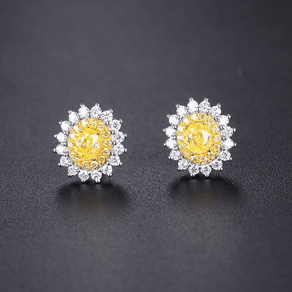 14k Gold 1.09 Ctw Natural Yellow Diamond & Diamond Earrings: Ref:231181195 // gold content:14k gold // main gemstone:yellow diamond // shape:oval // carat weight:0. 66ct // color:yellow // treatment:natural // // adjacent gemstone 2 : diamond // shape:round // 
