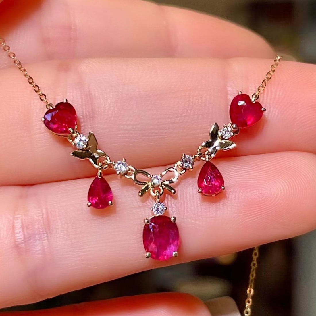 14k Gold 2.28 Ctw Natural Ruby & Diamond Necklace: Ref:231181236 // gold content:14k gold // main gemstone:ruby // shape:multiple // carat weight:2. 16ct // color:red // treatment:natural // // adjacent gemstone 2 : diamond // shape:round // carat