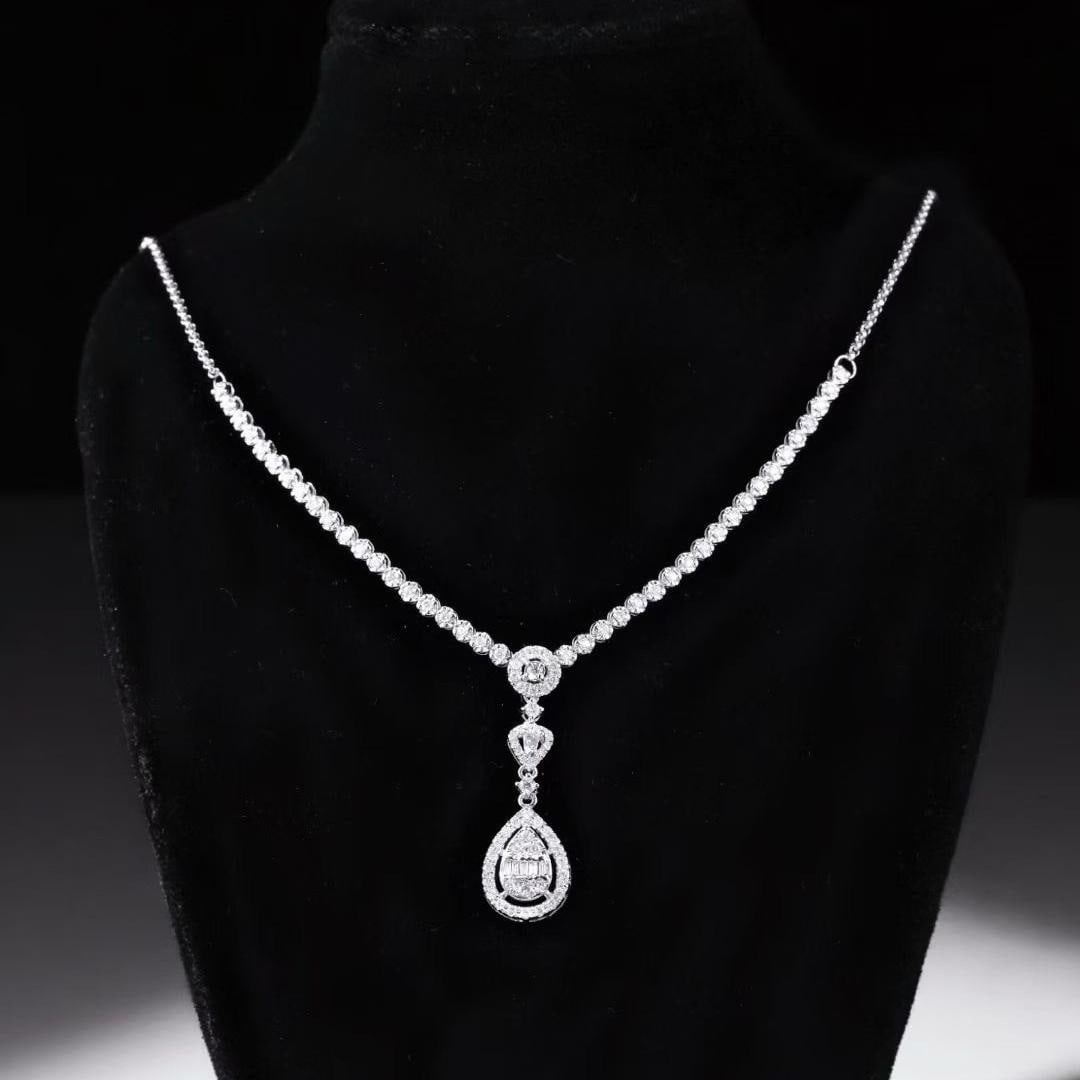 14k Gold 1.08 Ct Natural H Diamond Necklace: Ref:231182013 // gold content:14k gold // main gemstone:diamond // shape:multiple // carat weight:1. 08ct // clarity grade:vs-si // color:h // treatment:natural // Condition: New Low Estimate: 4800.00