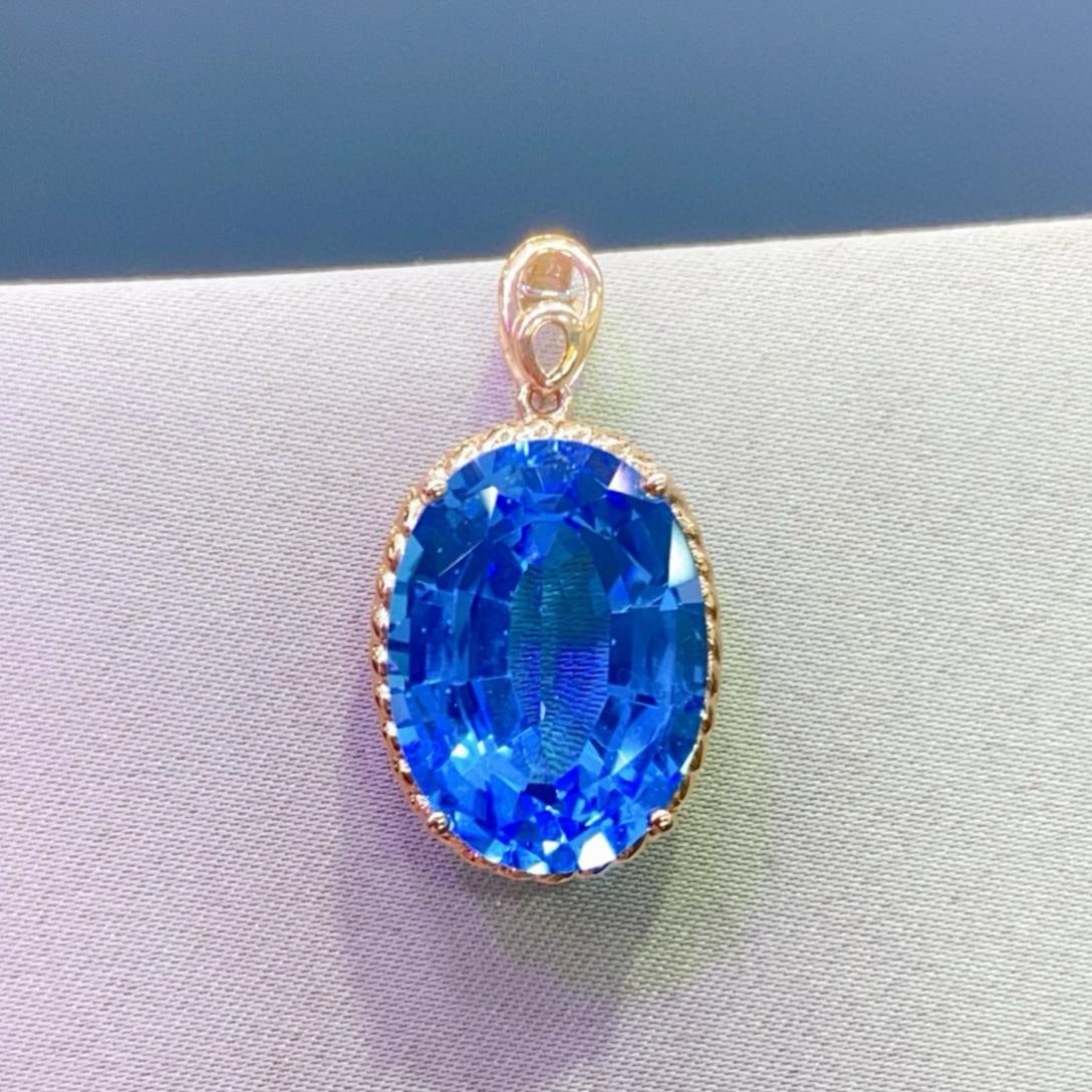14k Gold 14.8 Ct Natural Topaz Pendant( Without Chain ): Ref:231182049 // gold content:14k gold // main gemstone:topaz // shape:oval // carat weight:14. 8ct // color:blue // treatment:natural // Condition: New Low Estimate: 2200.00 High Estimate: 3300.00
