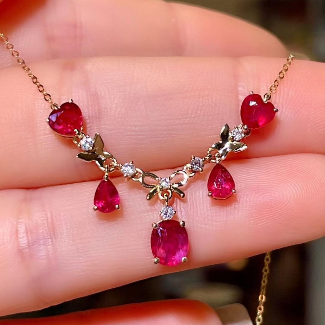 14k Gold 2.28 Ctw Natural Ruby & Diamond Necklace: Ref:231182077 // gold content:14k gold // main gemstone:ruby // shape:multiple // carat weight:2. 16ct // color:red // treatment:natural // // adjacent gemstone 2 : diamond // shape:round // carat