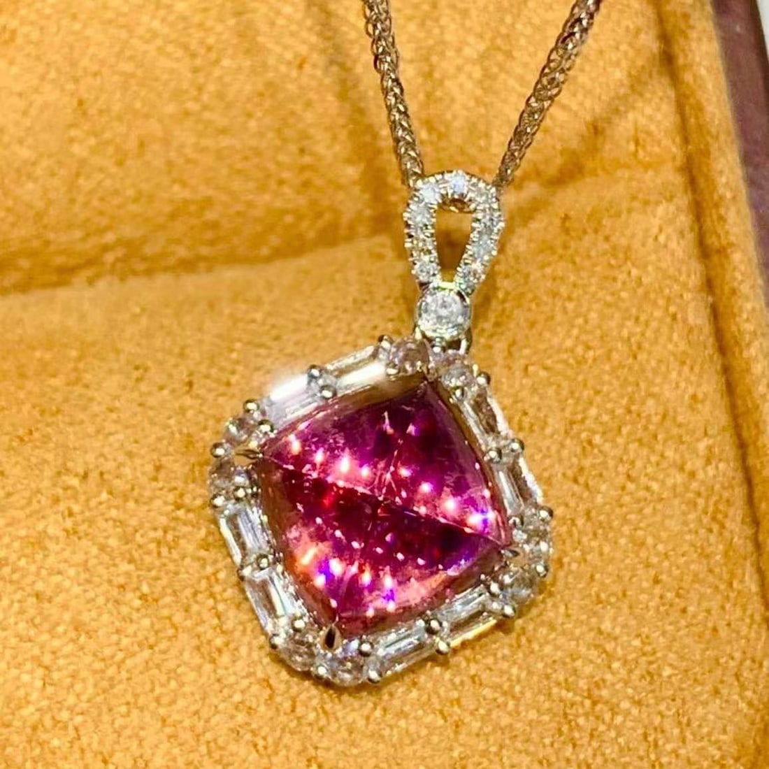 14k Gold 3 Ct Natural Tourmaline & Diamond & Sapphire Pendant( Without Chain ): Ref:231182193 // gold content:14k gold // main gemstone:tourmaline // shape:sugar-loaf // carat weight:3ct // color:red // treatment:natural // // adjacent gemstone 2 : diamond // shape:round //