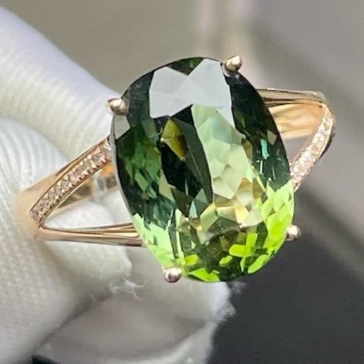 14k Gold 6.25 Ct Natural Tourmaline & Diamond Ring: Ref:231182199 // gold content:14k gold // ring size:7. 25us // // main gemstone:tourmaline // shape:oval // carat weight:6. 25ct // color:green // treatment:natural // // adjacent gemstone 2 :