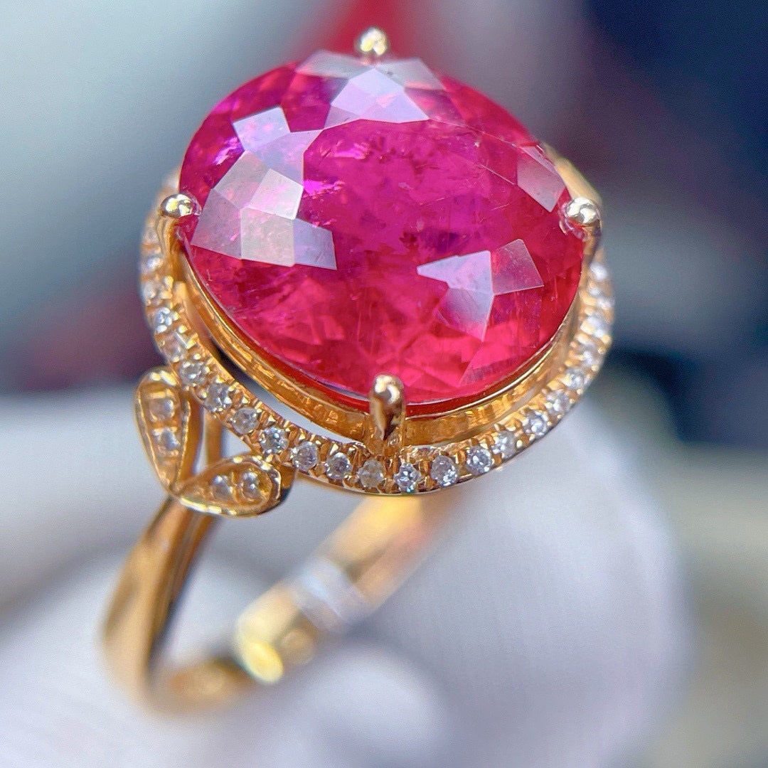 14k Gold 5.8 Ct Natural Tourmaline & Diamond Ring: Ref:231182200 // gold content:14k gold // ring size:7. 25us // // main gemstone:tourmaline // shape:oval // carat weight:5. 8ct // color:red // treatment:natural // // adjacent gemstone 2 : diamond