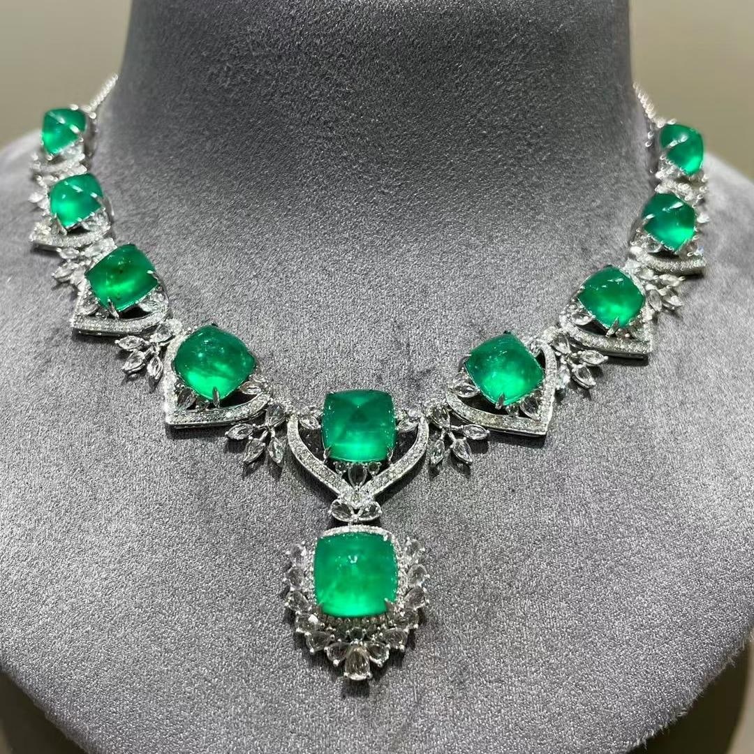 14k Gold 22.1 Ct Natural Emerald & Diamond & Sapphire Necklace: Ref:231182235 // gold content:14k gold // main gemstone:emerald // shape:sugar-loaf // carat weight:22. 1ct // color:green // treatment:natural // // adjacent gemstone 2 : diamond // shape:round //