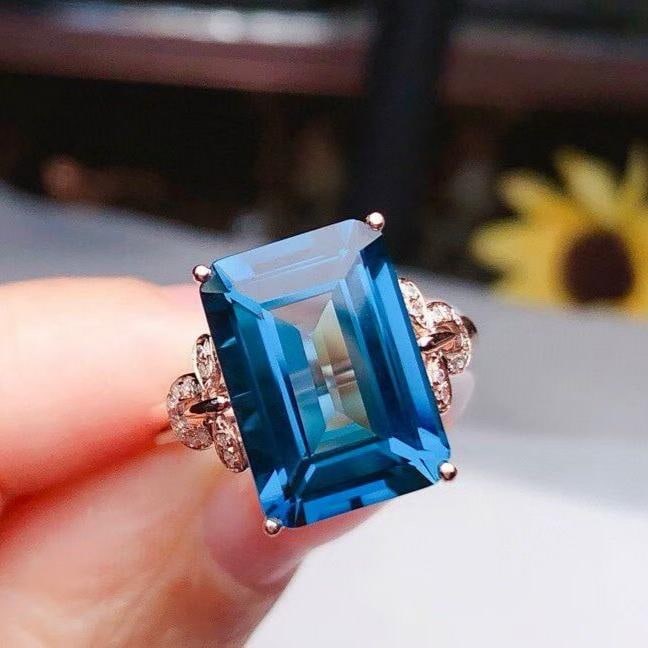 14k Gold 8.15 Ct Natural Topaz & Diamond Ring: Ref:231182243 // gold content:14k gold // ring size:7. 25us // // main gemstone:topaz // shape:octagonal // carat weight:8. 15ct // color:blue // treatment:natural // // adjacent gemstone 2 : diamond