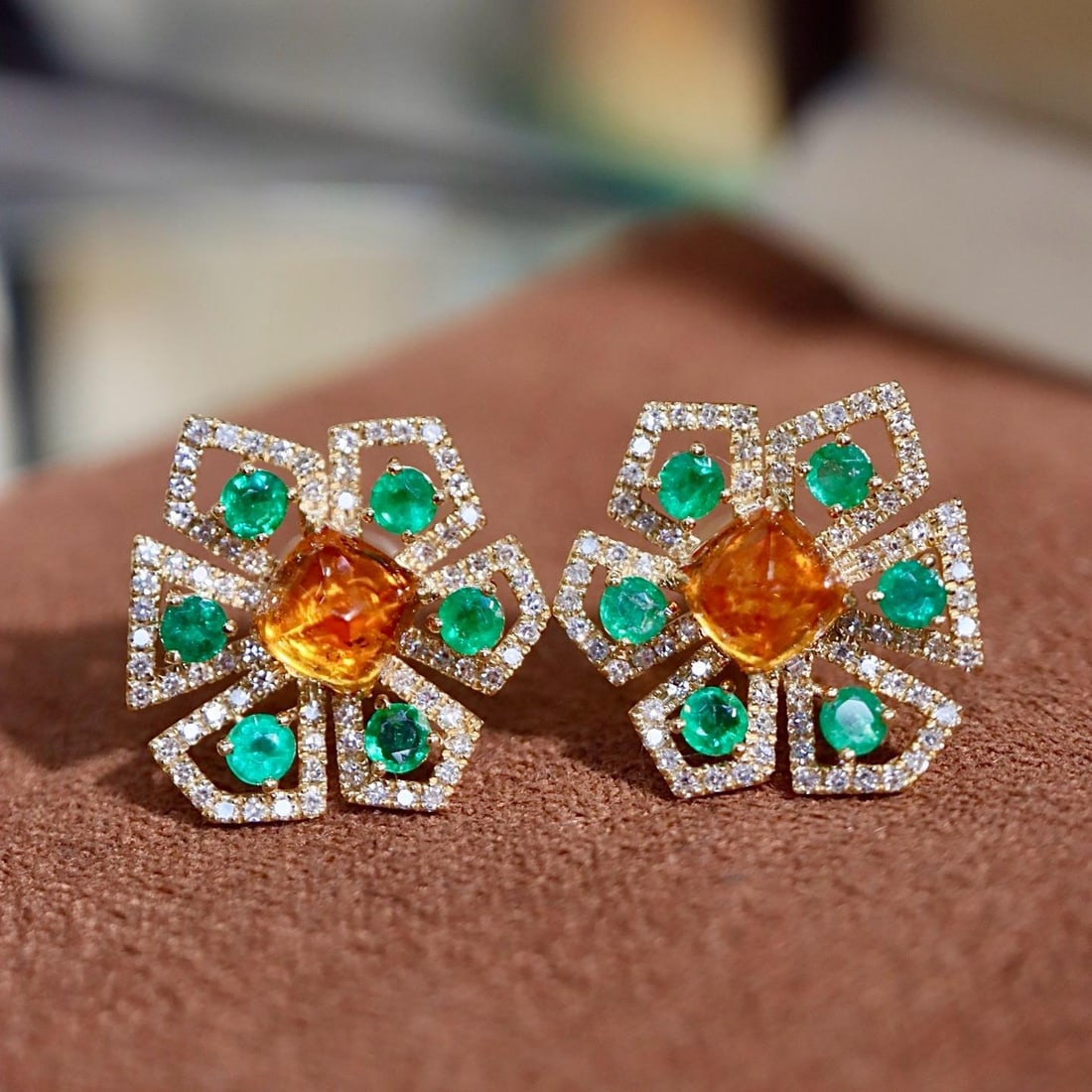 14k Gold 2.69 Ctw Natural Spessartine & Diamond Earrings: Ref:231182250 // gold content:14k gold // main gemstone:spessartine // shape:sugar-loaf // carat weight:2. 34ct // color:orange // treatment:natural // // adjacent gemstone 2 : diamond // shape:round 