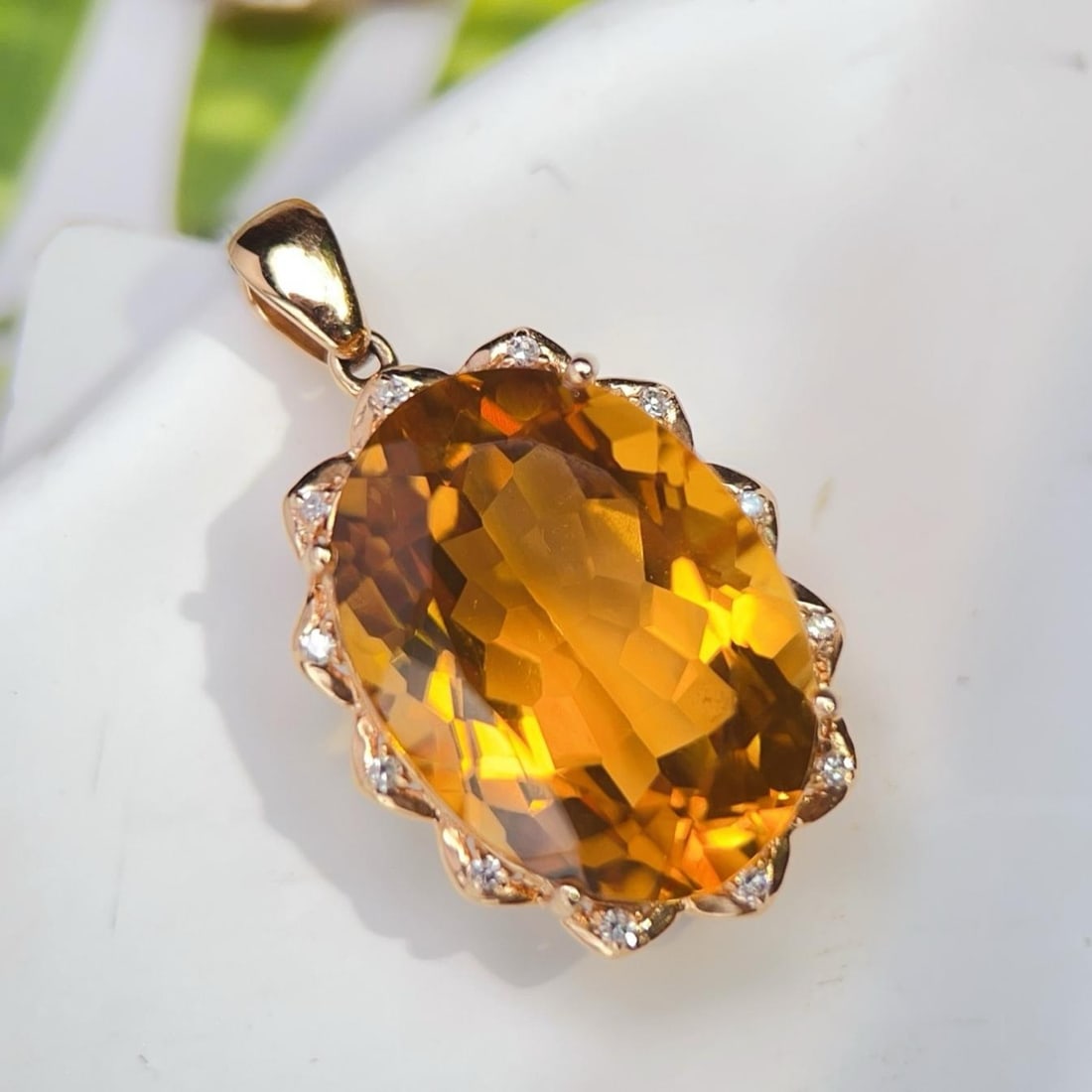 14k Gold 12.76 Ctw Natural Citrine & Diamond Pendant( Without Chain ): Ref:231182252 // gold content:14k gold // main gemstone:citrine // shape:oval // carat weight:12. 7ct // color:yellow // treatment:natural // // adjacent gemstone 2 : diamond // number of stones:12