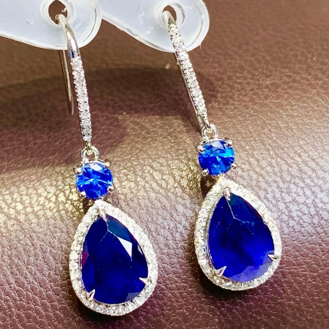 14k Gold 4 Ct Natural Sapphire & Diamond Earrings: Ref:231182263 // gold content:14k gold // main gemstone:sapphire // shape:pear // carat weight:4ct // color:blue // treatment:natural // // adjacent gemstone 2 : diamond // shape:round // clarity grad
