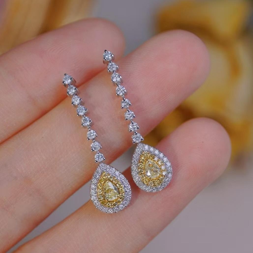 14k Gold 1.00 Ctw Natural Yellow Diamond & Diamond Earrings: Ref:231182280 // gold content:14k gold // main gemstone:yellow diamond // shape:pear // carat weight:0. 24ct // color:yellow // treatment:natural // // adjacent gemstone 2 : diamond // shape:round //