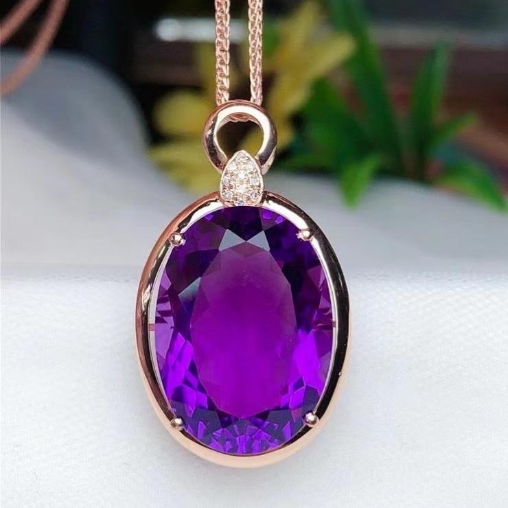 14k Gold 12.45 Ct Natural Amethyst & Diamond Pendant( Without Chain ): Ref:231182300 // gold content:14k gold // main gemstone:amethyst // shape:oval // carat weight:12. 45ct // color:purple // treatment:natural // // adjacent gemstone 2 : diamond // number of stones:10