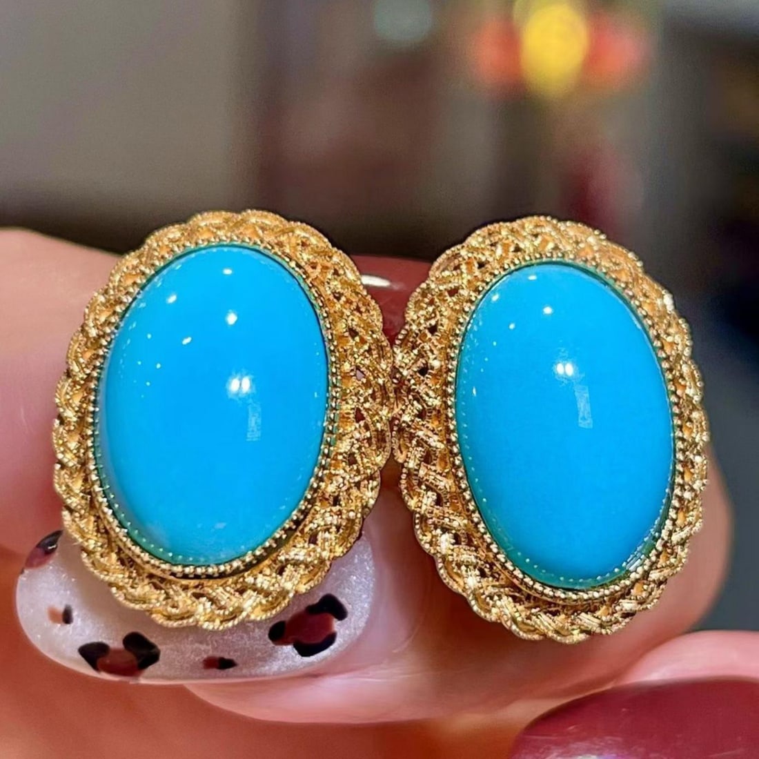 14k Gold 8.86 Ct Natural Blue Turquoise Earrings: Ref:231182335 // gold content:14k gold // main gemstone:blue turquoise // shape:oval // carat weight:8. 86ct // color:blue // treatment:natural // Condition: New Low Estimate: 5500.00 High Estimate: