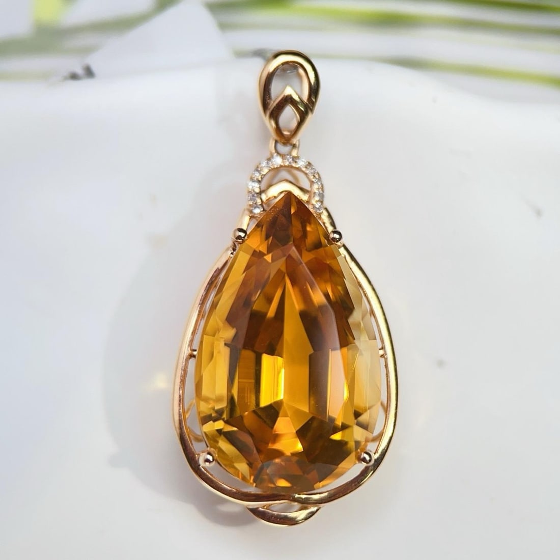 14k Gold 14.43 Ctw Natural Citrine & Diamond Pendant( Without Chain ): Ref:231182343 // gold content:14k gold // main gemstone:citrine // shape:pear // carat weight:14. 4ct // color:yellow // treatment:natural // // adjacent gemstone 2 : diamond // number of stones:12 //