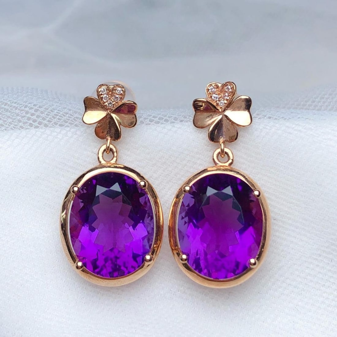 14k Gold 7.25 Ct Natural Amethyst & Diamond Earrings: Ref:231182348 // gold content:14k gold // main gemstone:amethyst // shape:oval // carat weight:7. 25ct // color:purple // treatment:natural // // adjacent gemstone 2 : diamond // number of stones:10