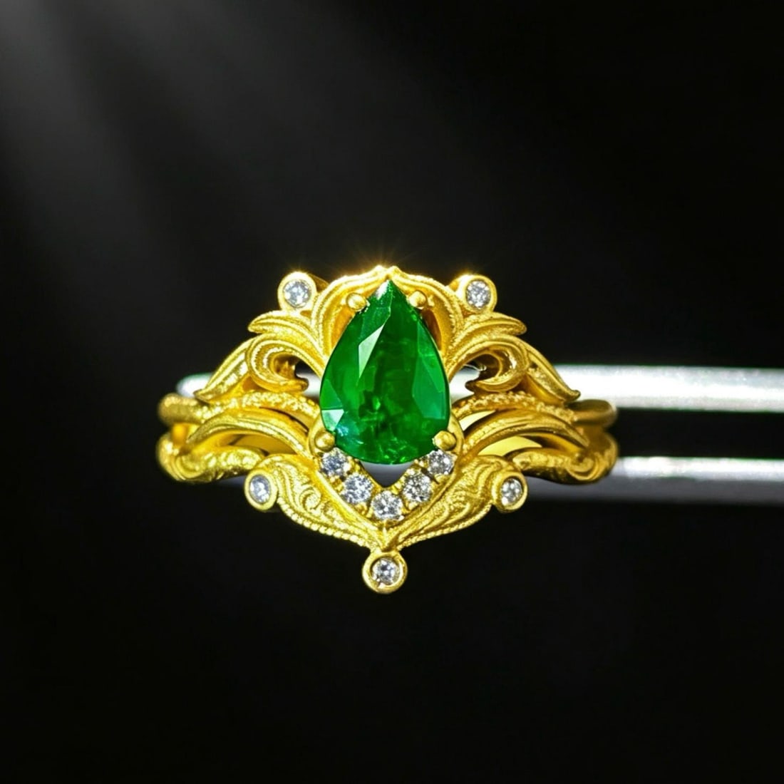 14k Gold 0.58 Ctw Vivid Green Natural Emerald & Diamond Ring: Ref:231182352 // gold content:14k gold // ring size:7. 25us // // main gemstone:emerald // shape:pear // carat weight:0. 52ct // color:vivid green // treatment:natural // // adjacent gemstone 2 : diam