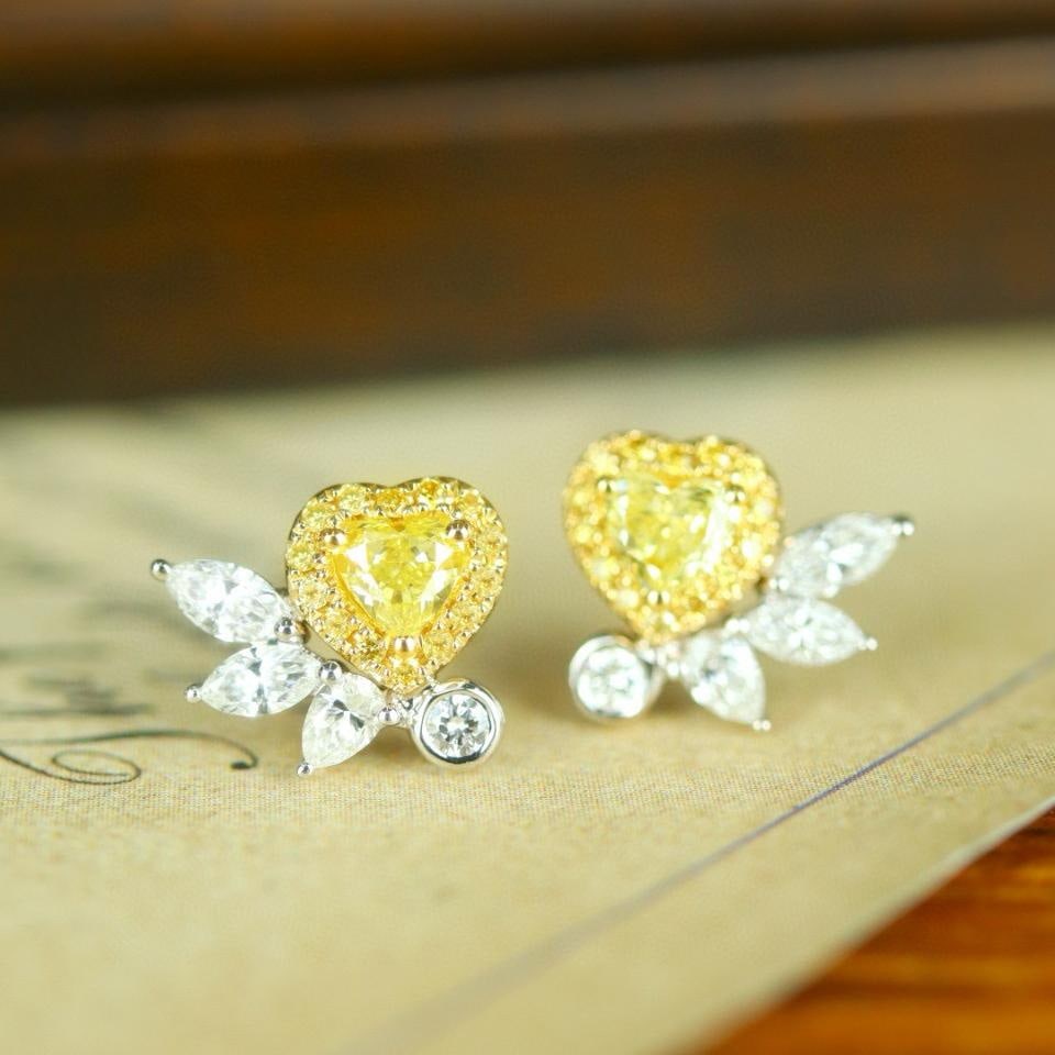 14k Gold 0.72 Ctw Natural Yellow Diamond & Diamond Earrings: Ref:231182414 // gold content:14k gold // main gemstone:yellow diamond // shape:heart // carat weight:0. 30ct // color:yellow // treatment:natural // // adjacent gemstone 2 : diamond //