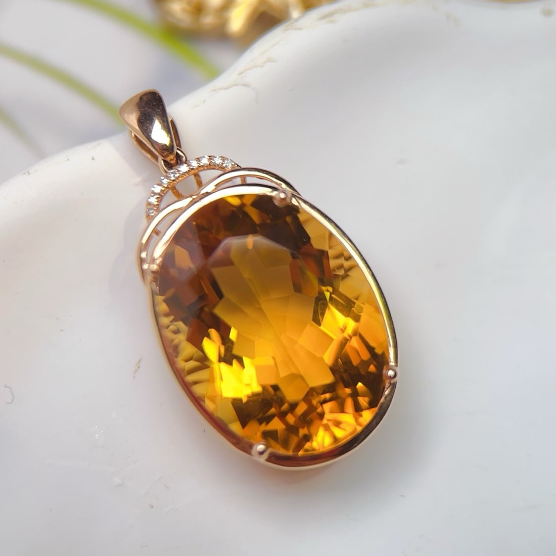 14k Gold 17.08 Ctw Natural Citrine & Diamond Pendant( Without Chain ): Ref:231182442 // gold content:14k gold // main gemstone:citrine // shape:oval // carat weight:17. 05ct // color:yellow // treatment:natural // // adjacent gemstone 2 : diamond // number of stones:10 /