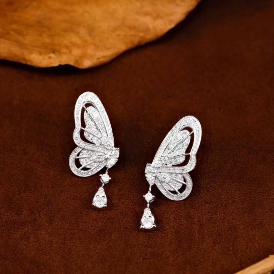 14k Gold 0.56 Ct Natural H Diamond & Butterfly Earrings: Ref:231183003 // gold content:14k gold // main gemstone:diamond // shape:round // carat weight:0. 56ct // clarity grade:vs-si // color:h // treatment:natural // cut grade:g // Condition: New Low