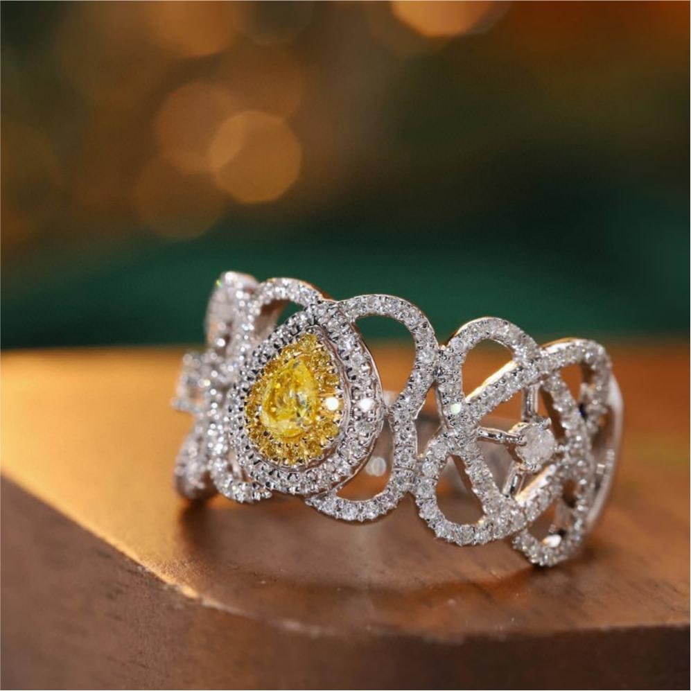 14k Gold 0.55 Ctw Natural Yellow Diamond & Diamond Ring: Ref:231183035 // gold content:14k gold // ring size:7. 25us // // main gemstone:yellow diamond // shape:pear // carat weight:0. 10ct // color:yellow // treatment:natural // // adjacent gemstone 2 :