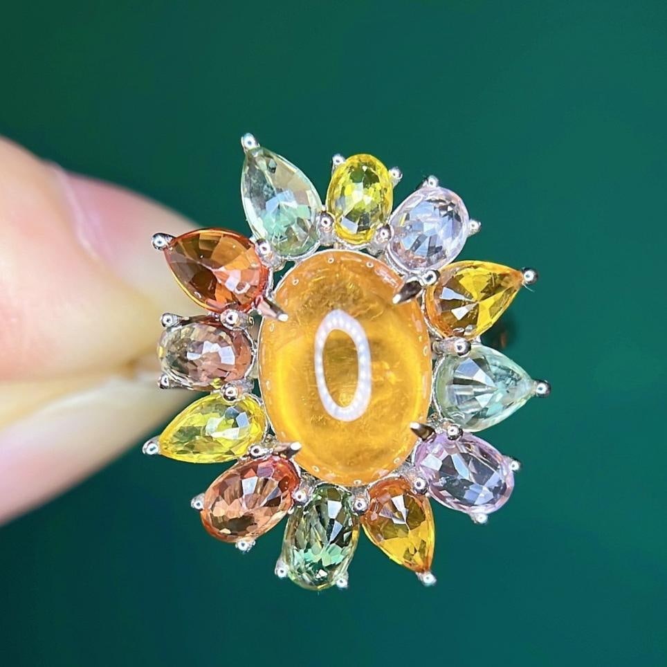 14k Gold 7.20 Ctw Natural Spessartine & Sapphire Ring: Ref:231183073 // gold content:14k gold // ring size:7. 25us // // main gemstone:spessartine // shape:oval // carat weight:3. 76ct // color:orange // treatment:natural // // adjacent gemstone 2 :