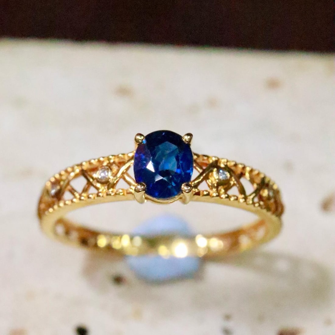 14k Gold 0.57 Ctw Natural Sapphire & Diamond Ring: Ref:231183102 // gold content:14k gold // ring size:7. 25us // // main gemstone:sapphire // shape:oval // carat weight:0. 56ct // color:blue // treatment:natural // // adjacent gemstone 2 : diamond