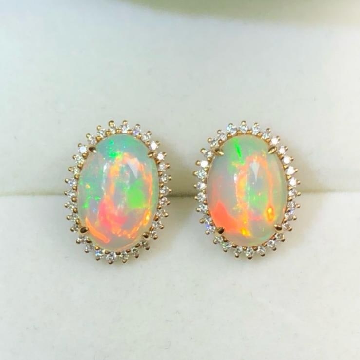 14k Gold 3.0 Ct Natural Opal & Diamond Earrings: Ref:231183112 // gold content:14k gold // main gemstone:opal // shape:oval // carat weight:3. 0ct // color:color // treatment:natural // // adjacent gemstone 2 : diamond // shape:round // clarity grad