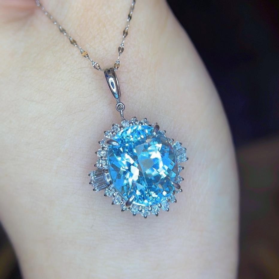 14k Gold 8.22 Ctw Natural Aquamarine & Diamond Pendant( Without Chain ): Ref:231183117 // gold content:14k gold // main gemstone:aquamarine // shape:oval // carat weight:7. 65ct // color:blue // treatment:natural // // adjacent gemstone 2 : diamond // shape:multiple //
