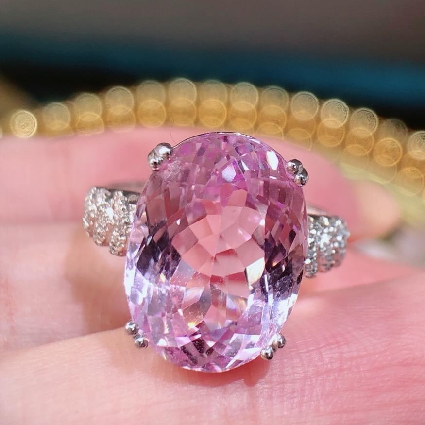 14k Gold 9.2 Ct Natural Kunzite & Diamond Ring: Ref:231183141 // gold content:14k gold // ring size:7. 25us // // main gemstone:kunzite // shape:oval // carat weight:9. 2ct // color:pinkish purple // treatment:natural // // adjacent gemstone 2 :