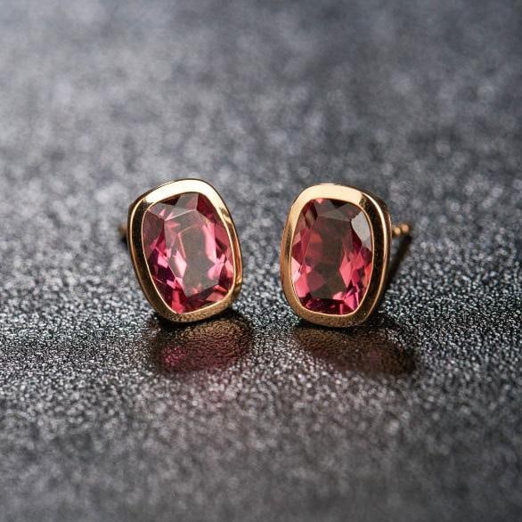 14k Gold 2.58 Ct Natural Tourmaline Earrings: Ref:231183147 // gold content:14k gold // main gemstone:tourmaline // shape:cushion // carat weight:2. 58ct // color:red // treatment:natural // Condition: New Low Estimate: 1900.00 High Estimate: