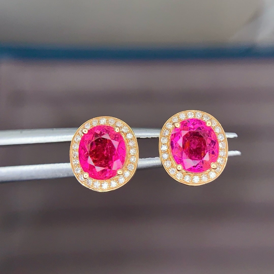 14k Gold 1.8 Ct Natural Tourmaline & Diamond Earrings: Ref:231183201 // gold content:14k gold // main gemstone:tourmaline // shape:oval // carat weight:1. 8ct // color:red // treatment:natural // // adjacent gemstone 2 : diamond // shape:round // clarity