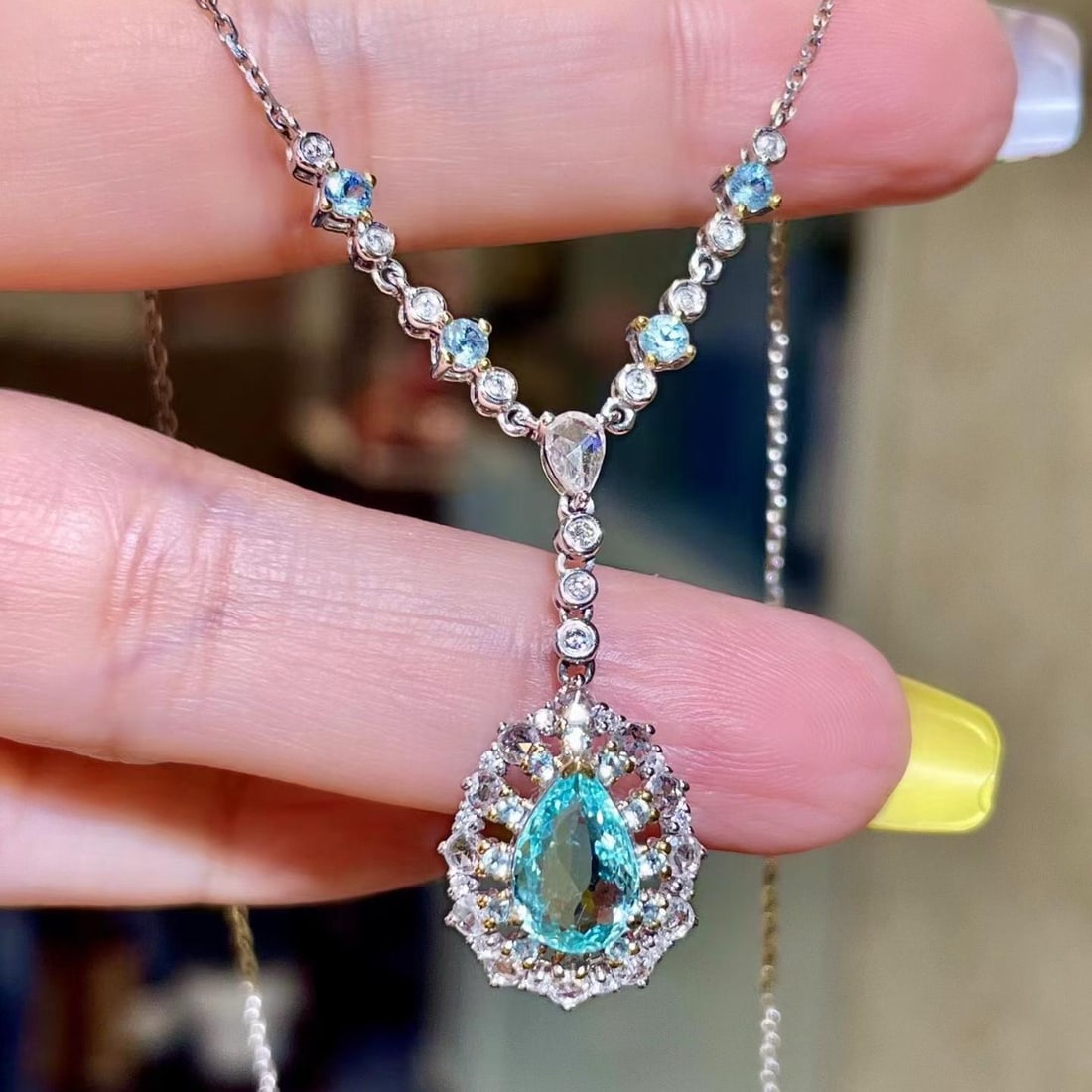 14k Gold 1.95 Ctw Natural Paraiba Tourmaline & Diamond Necklace: Ref:231183251 // gold content:14k gold // main gemstone:paraiba tourmaline // shape:pear // carat weight:1. 20ct // color:blue // treatment:natural // // adjacent gemstone 2 : diamond // shape:round