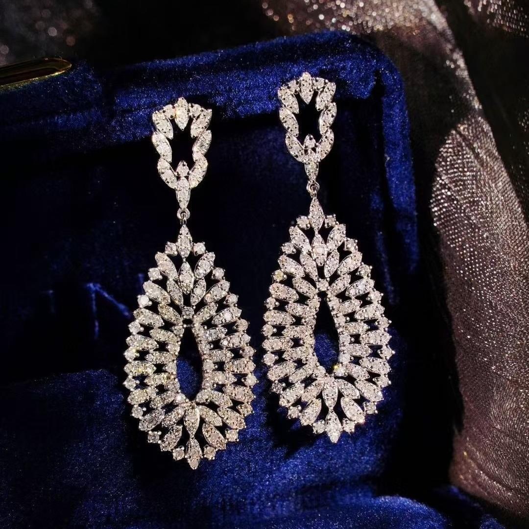 14k Gold 1.2 Ct Natural H Diamond Earrings: Ref:231184012 // gold content:14k gold // main gemstone:diamond // shape:round // carat weight:1. 2ct // clarity grade:vs-si // color:h // treatment:natural // cut grade:g // Condition: New Low