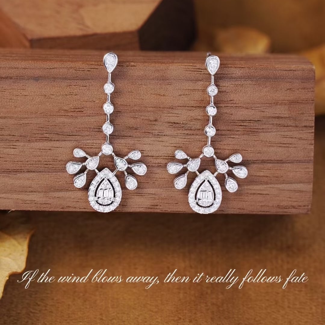 14k Gold 0.6 Ct Natural H Diamond Earrings: Ref:231184046 // gold content:14k gold // main gemstone:diamond // shape:multiple // carat weight:0. 6ct // clarity grade:vs-si // color:h // treatment:natural // Condition: New Low Estimate: 2400.00