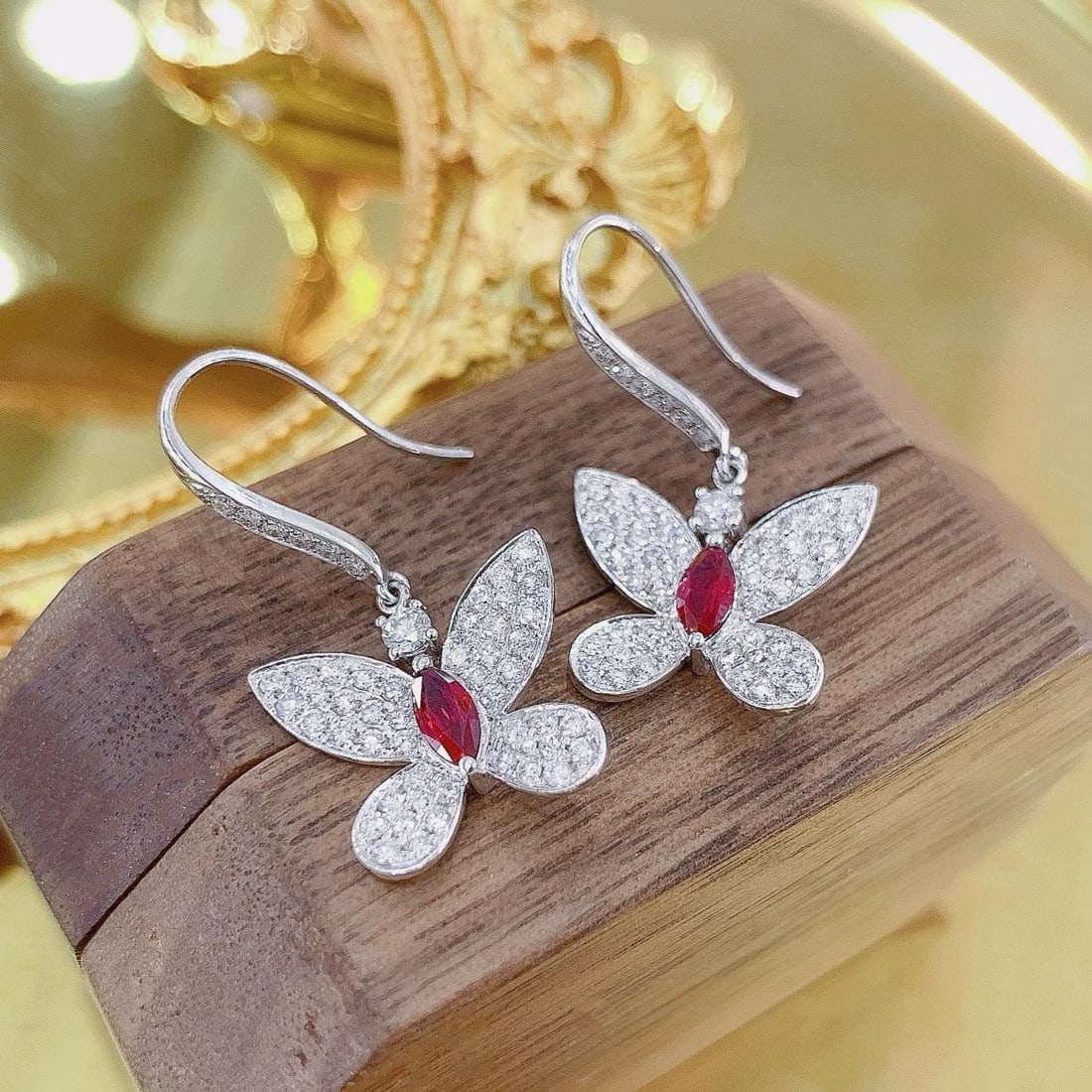 14k Gold 1.38 Ctw Natural Ruby & Diamond & Butterfly Earrings: Ref:231184051 // gold content:14k gold // main gemstone:ruby // shape:marquise // carat weight:0. 44ct // color:red // treatment:natural // // adjacent gemstone 2 : diamond // shape:round // carat