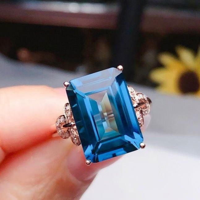 14k Gold 8.15 Ct Natural Topaz & Diamond Ring: Ref:231184053 // gold content:14k gold // ring size:7. 25us // // main gemstone:topaz // shape:octagonal // carat weight:8. 15ct // color:blue // treatment:natural // // adjacent gemstone 2 : diamond
