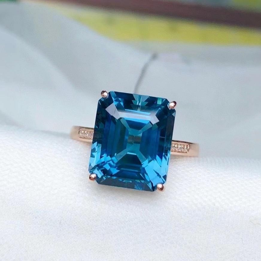 14k Gold 8.60 Ct Natural Topaz & Diamond Ring: Ref:231184175 // gold content:14k gold // ring size:7. 25us // // main gemstone:topaz // shape:octagonal // carat weight:8. 60ct // color:blue // treatment:natural // // adjacent gemstone 2 : diamond