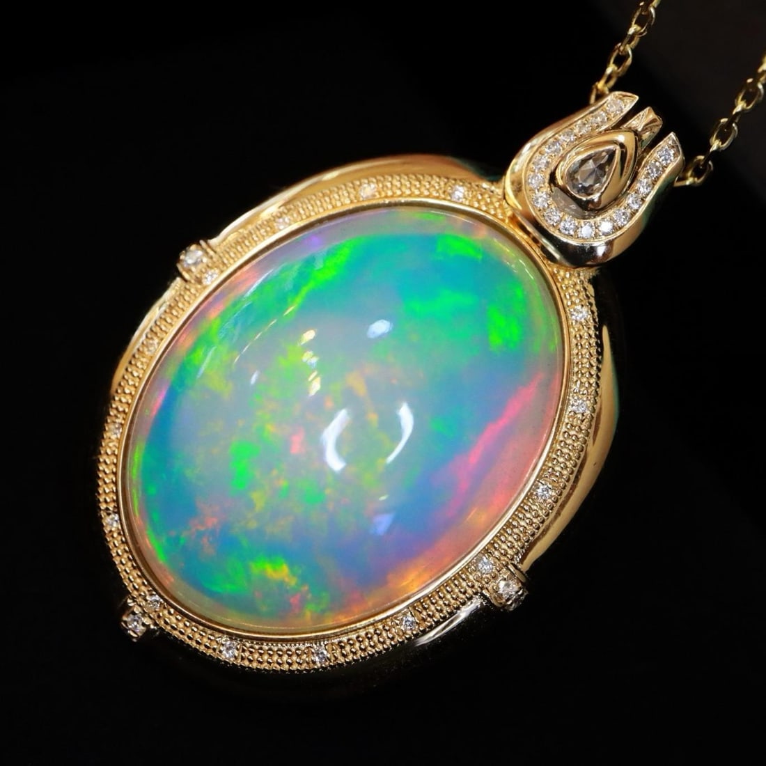 14k Gold 26.23 Ctw Natural Opal & Diamond Pendant( Without Chain ): Ref:231184238 // gold content:14k gold // main gemstone:opal // shape:oval // carat weight:26. 06ct // color:white // treatment:natural // // adjacent gemstone 2 : diamond // shape:round // carat weig