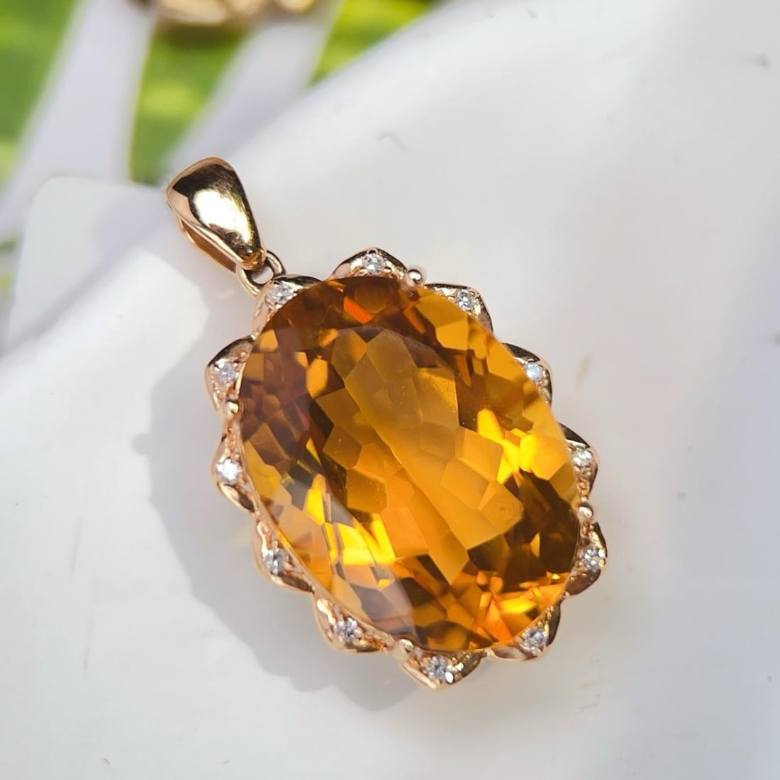 14k Gold 12.76 Ctw Natural Citrine & Diamond Pendant( Without Chain ): Ref:231184257 // gold content:14k gold // main gemstone:citrine // shape:oval // carat weight:12. 7ct // color:yellow // treatment:natural // // adjacent gemstone 2 : diamond // number of stones:12