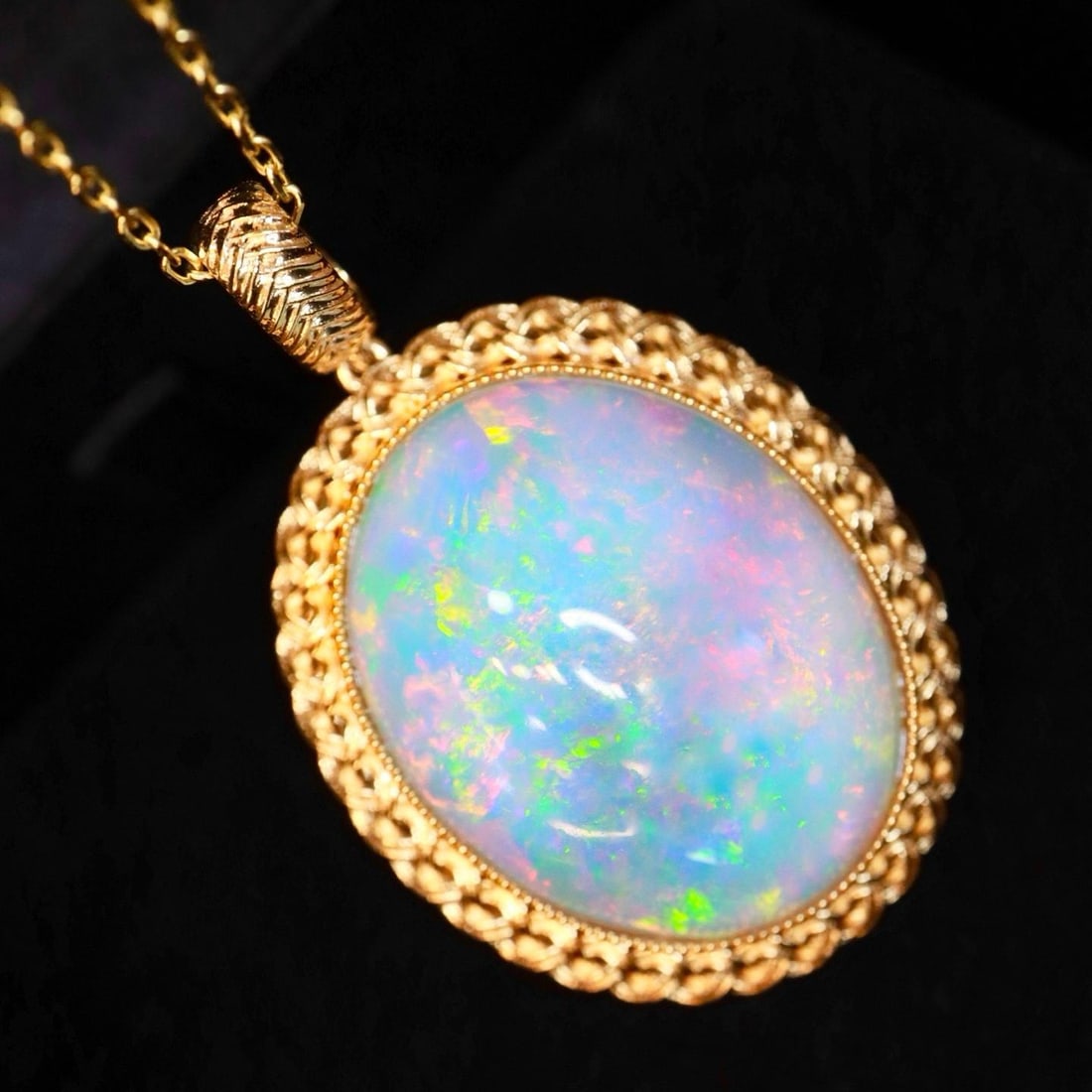 14k Gold 19.63 Ct Natural Opal Pendant( Without Chain ): Ref:231184273 // gold content:14k gold // main gemstone:opal // shape:oval // carat weight:19. 63ct // color:white // treatment:natural // Condition: New Low Estimate: 7300.00 High Estimate: 11000.00