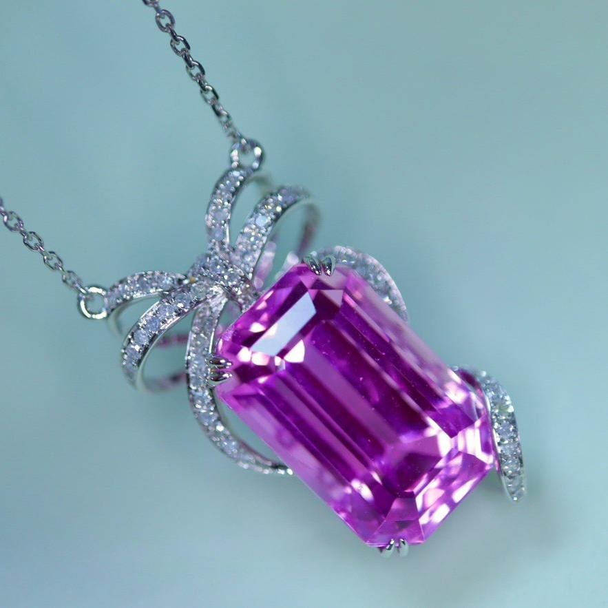 14k Gold 15.83 Ctw Natural Kunzite & Diamond Necklace: Ref:231184290 // gold content:14k gold // main gemstone:kunzite // shape:octagonal // carat weight:15. 58ct // color:pinkish purple // treatment:natural // // adjacent gemstone 2 : diamond //