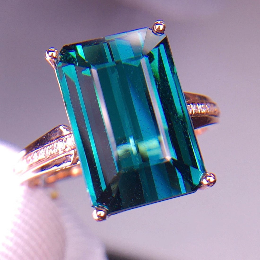 14k Gold 7 Ct Natural Tourmaline & Diamond Ring: Ref:231184299 // gold content:14k gold // ring size:7. 25us // // main gemstone:tourmaline // shape:octagonal // carat weight:7ct // color:blue // treatment:natural // // adjacent gemstone 2 :